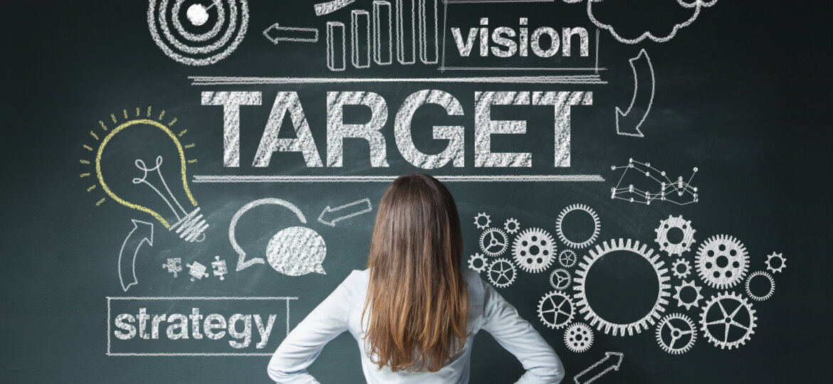 Businesswoman looking at strategy sketch